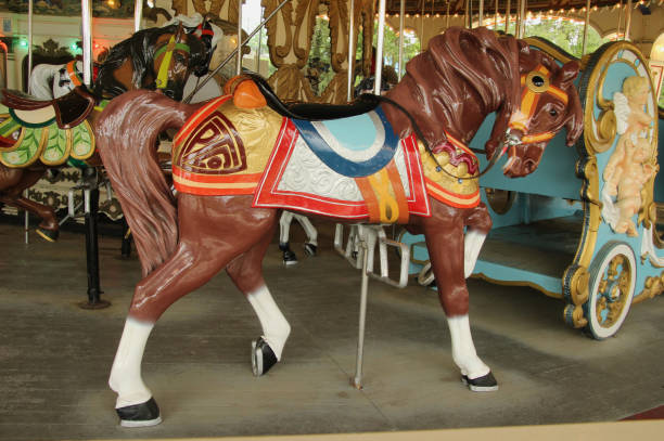 istock Brown Carousel Horse with Head Down 1155418138