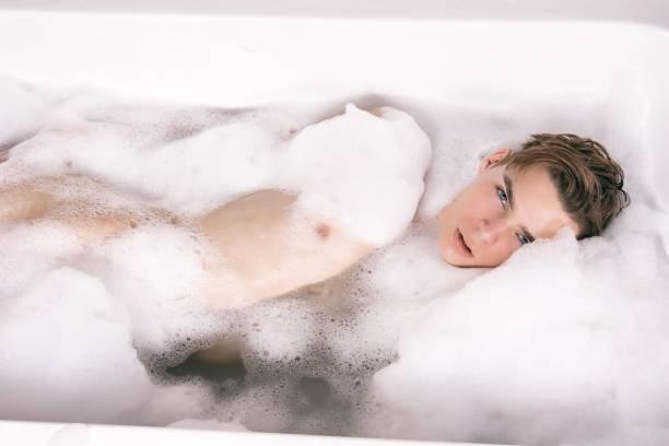 istock Handsome guy in the bathroom 1155419884