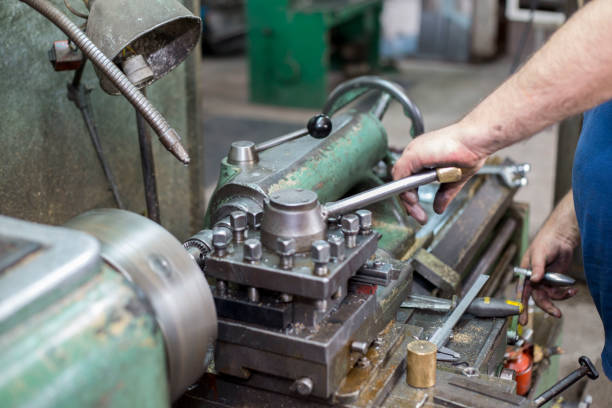 istock A man in a metallurgical workshop uses a lathe for processing metal objects for the production of gas boilers. 1155419920