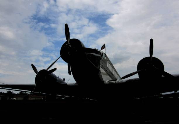 istock Historic propeller machine after the flight at dusk 1155420534