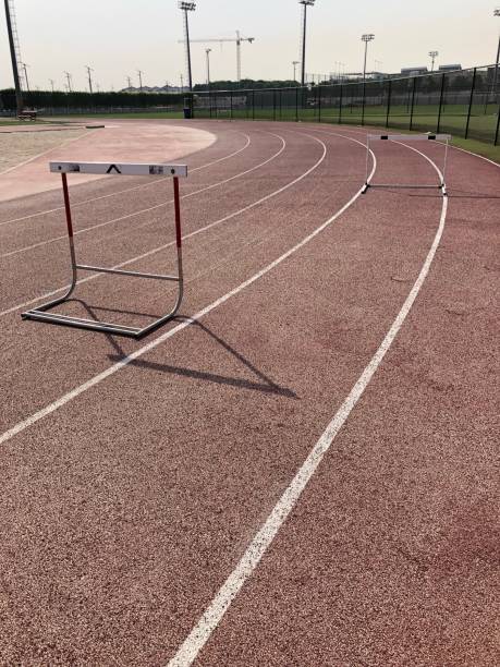istock Single Athletics hurdle along a running track bend 1155420785