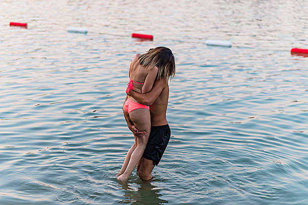 istock Young Couple is Enjoying in the River 1155422362