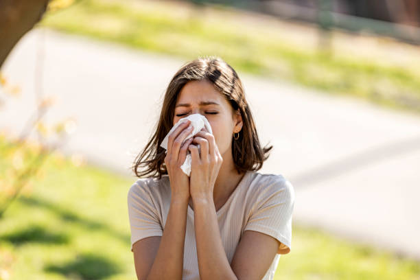 istock Attractive Woman Outdoors is Having Allergy 1155424755