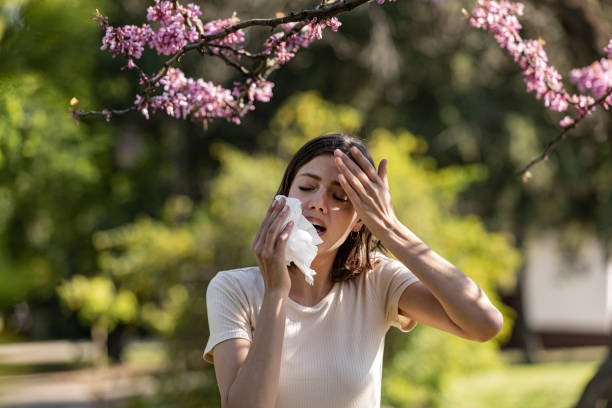 istock Attractive Woman Outdoors is Having Allergy 1155424860