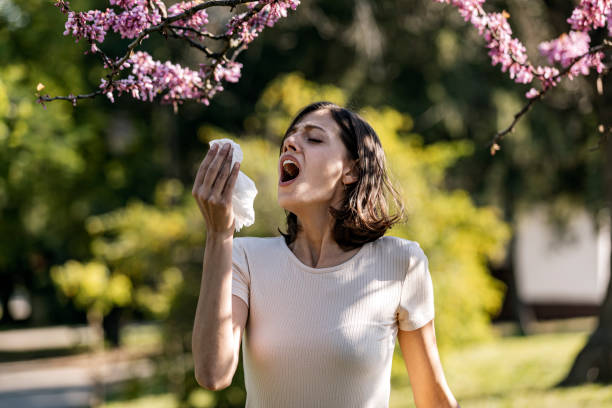 istock Attractive Woman Outdoors is Having Allergy 1155424948