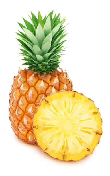 istock Whole and halved pineapples isolated on white background. 1155425953