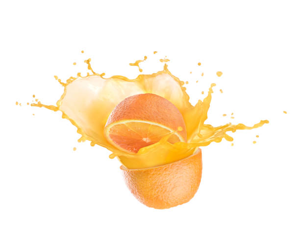 istock orange juice splash with orange 1155428360