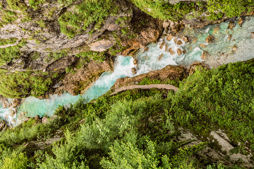 Crystal clear emerald mountain river flows between rocks in a deep canyon Tolmin Gorge in Triglav national park,Primorska, Slovenia,Julian Alps,Europe,Nikon D850