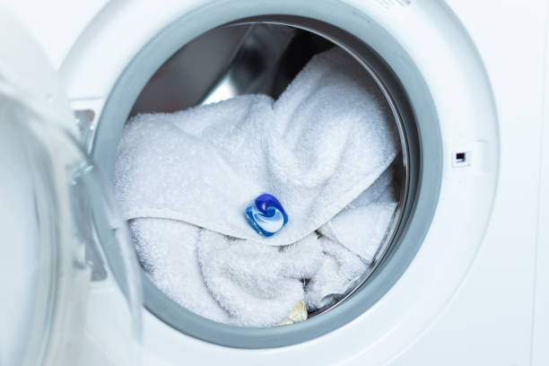istock Washing gel in a washing machine. 1155442964