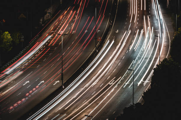 istock Light trails and busy traffic 1155443766