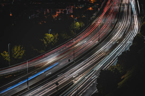 istock Light trails and busy traffic in KL 1155443853