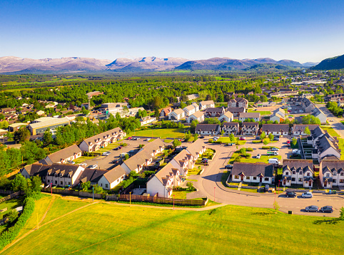 A view from the air of a housing estate located on the outskirts of the Scottish town of Aviemore.