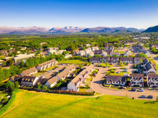 Housing development near Aviemore in Scotland A view from the air of a housing estate located on the outskirts of the Scottish town of Aviemore. cairngorm mountains stock pictures, royalty-free photos & images
