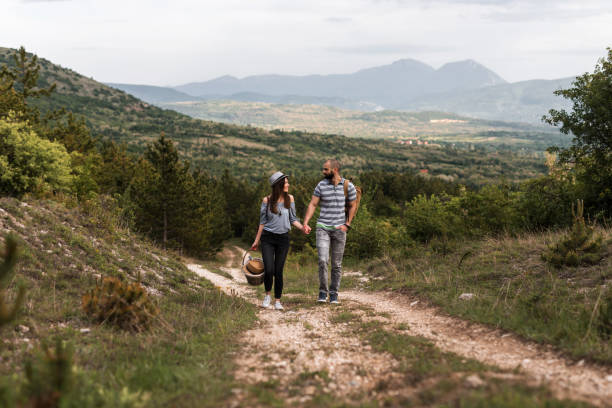 istock Young couple goes to picnic 1155446623