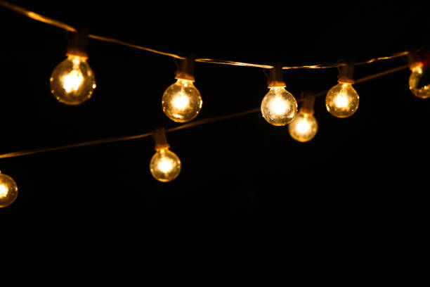 istock The light bulb in the dark background 1155449286