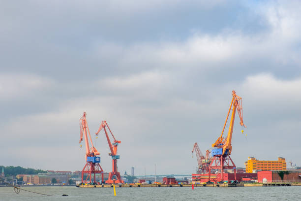 istock Shipyard with cranes at the harbour in Gothenburg 1155449489