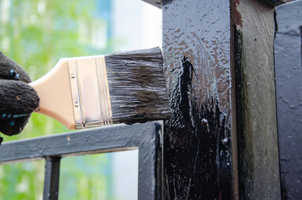 istock Paint brush and black paint. Painting. 1155452296