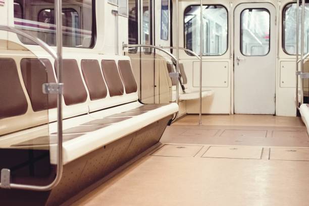 istock underground car without people with empty brown seats 1155453360
