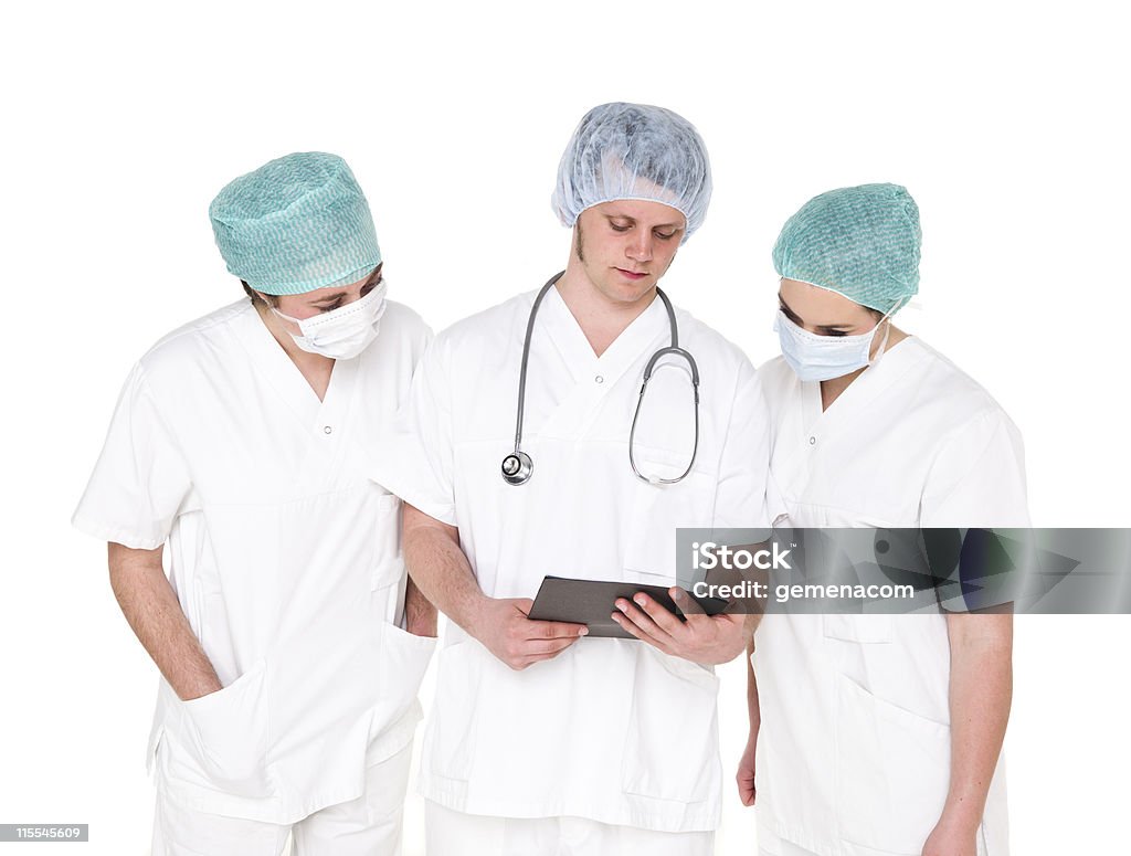 Medico e gli infermieri - Foto stock royalty-free di Accudire