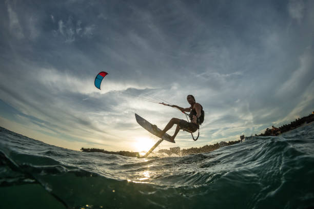 Surf rides Hydrofoilkite Kite surf ride his hydrofoilkite kiteboarding stock pictures, royalty-free photos & images