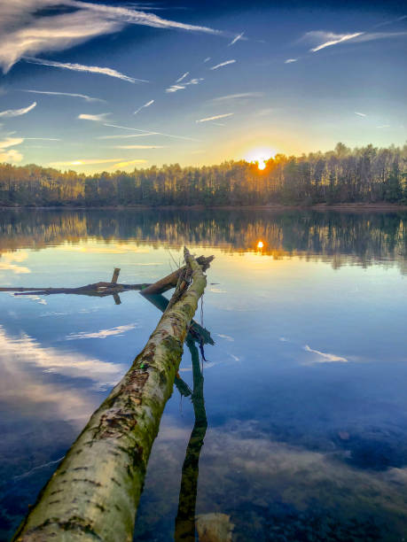 istock Tranquil idyllic lake landscape at sunset 1155458312