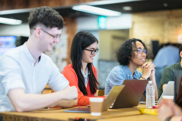 istock Group of multi ethnic people working together 1155459836