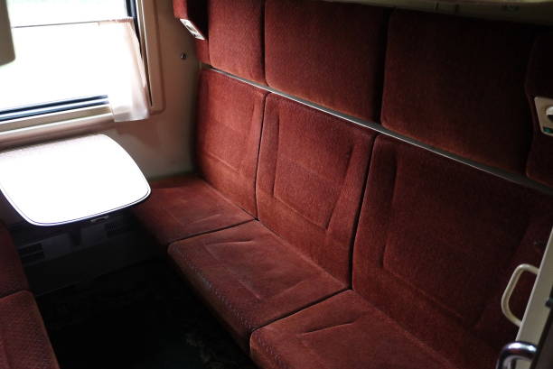 istock View of sleeping places in a compartment car. 1155460963
