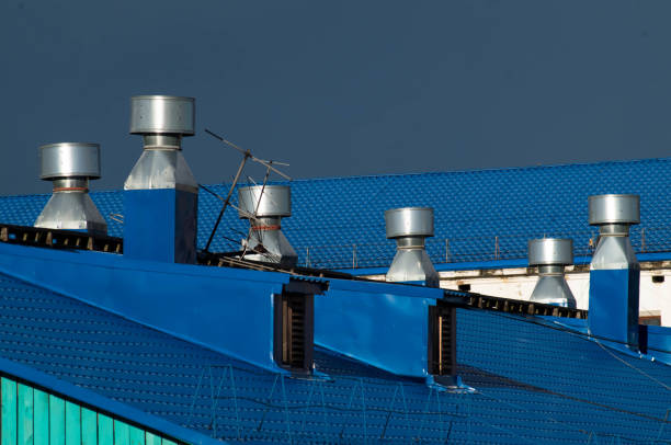 istock Blue roof and ventilation pipes on it. 1155461459