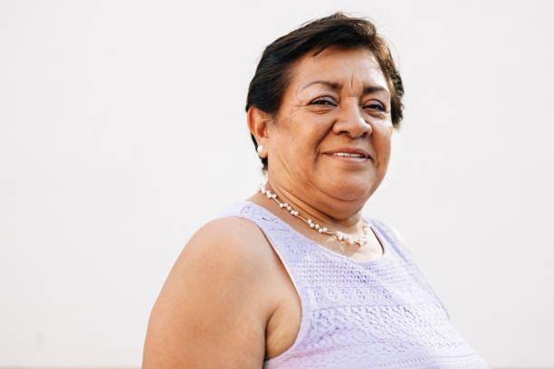 portrait of a mexican senior woman - senior women cheerful overweight smiling imagens e fotografias de stock