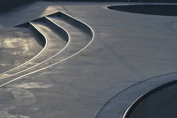 Skate Park in Late Afternoon Light Bowls and Stairs Alondra Park Skate Park steven harrie stock pictures, royalty-free photos & images