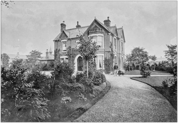 istock Antique vintage black and white photo: British countryside house 1155463015
