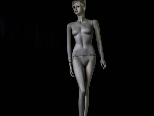 istock old dirty mannequin on a black background 1155466274