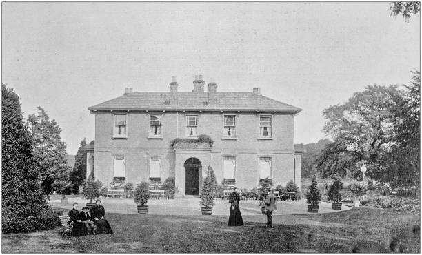istock Antique vintage black and white photo: British countryside house 1155466663