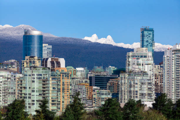 istock Downtown Vancouver skyscrapers with mountain view 1155472227