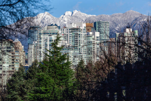 istock Downtown Vancouver skyscrapers with mountain view 1155472316