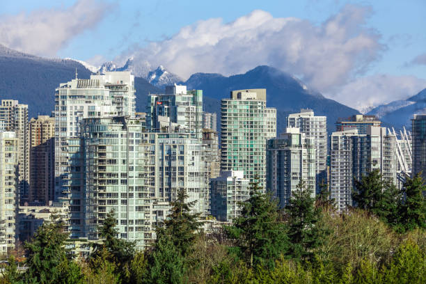 istock Downtown Vancouver skyscrapers with mountain view 1155472368