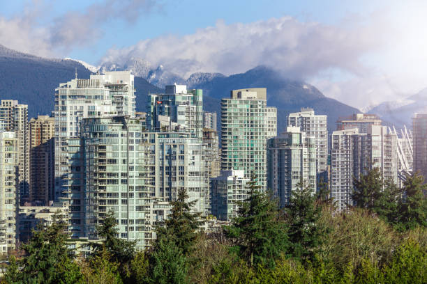 istock Downtown Vancouver skyscrapers with mountain view 1155472913
