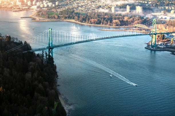 Lion's Gate Bridge aerial view in Vancouver, BC Lion's Gate Bridge aerial view in Vancouver, BC west vancouver stock pictures, royalty-free photos & images