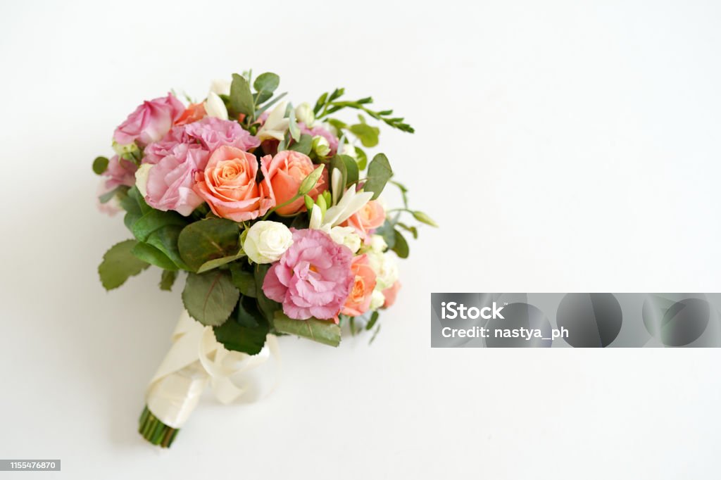 wedding bouquet with flowers roses on a white background with copy space. minimal concept. mockup Bouquet Stock Photo