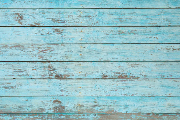 istock texture wooden background with old cracked blue paint 1155482204