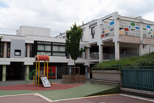 School with playground for children