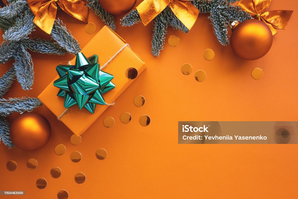 Christmas composition.  Background with gift box and decorations. Christmas composition.  Background with gift box and decorations.  Copy space.  Holiday concept. Art Stock Photo