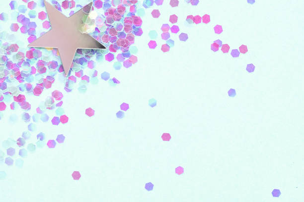 istock Confetti and silver stars on a blue background, festive concept. 1155484029