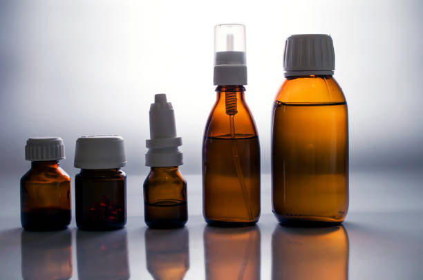 istock Medical bottles with medicine on white background 1155486001