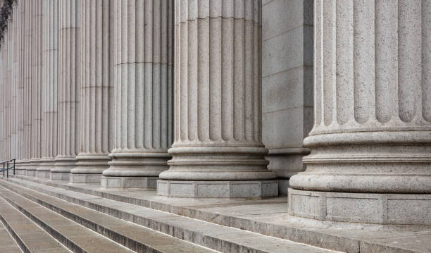 istock Stone pillars row and stairs detail. Classical building facade 1155488051