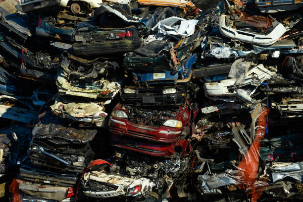 istock Pile of scrap vehicles stacked for recycling 1155490473