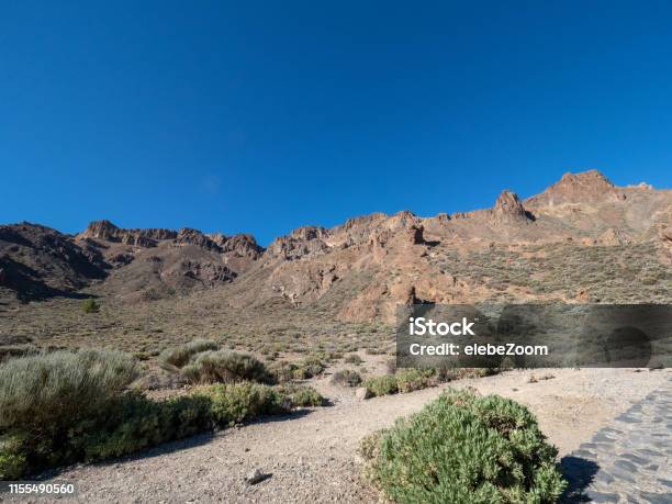 Volcanic Landscape In Los Roques And El Teide Stock Photo - Download Image Now - Arid Climate, Backgrounds, Blue