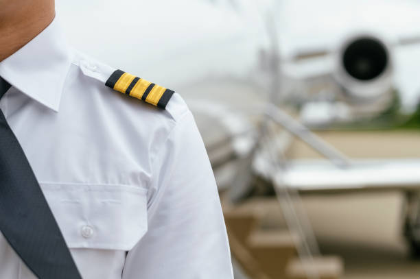 istock Private Jet. Captain. Pilot. Airport. Private Plane. Runaway. Private plane ready for boarding 1155490988