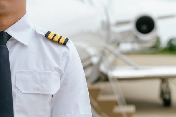 istock Private Jet. Captain. Pilot. Airport. Private Plane. Runaway. Private plane ready for boarding 1155491010
