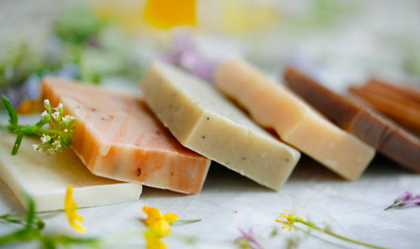 istock Handmade natural soaps with plants and flowers, closeup selective focus 1155491251